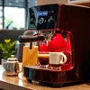 Atlantis coffee machine Sector 32 Noida with espresso cup and coffee setup on countertop