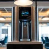 Atlantisplus.com modern coffee machine with digital display in cafe setting