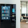 Coffee vending machine for office with variety of canned coffee and drinks in modern workspace