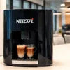 Nescafe coffee machine brewing espresso shots best instant coffee solutions for businesses
