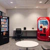 Best tea and coffee vending machine Noida setup in office lounge with seating and snack vending machine
