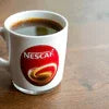 Nescafe coffee cup on table for vending machine for office Noida use