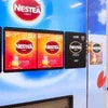 Nestea Masala Gold Tea Premix varieties displayed in a vending machine for quick beverage service