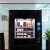 Atlantis Coffee Machine Distributor Gurugram vending machine with coffee pods and beverages display