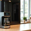 Coffee Walla Tea Coffee Machine Gurugram on wooden counter near window with natural light