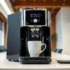 Modern coffee machine brewing espresso into white cup on kitchen counter