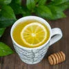 Lipton green tea vending machines in Delhi serving hot lemon green tea in a white cup with honey