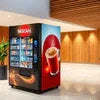 Tea premix in Noida vending machine with hot beverage options and cup dispenser