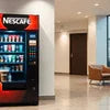 Atlantis vending machine Delhi Nescafe model placed in a modern office lounge area for beverage dispensing