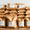 Bulk bags of coffee premix stacked for industrial or commercial use