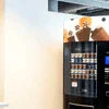 Coffee premix delivery Sector 136 vending machine with multiple coffee options displayed