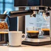 Modern espresso coffee machine brewing coffee with cup nearby coffee machine shop near me