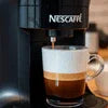 Nescafe coffee premix machine preparing a fresh cup near Sector 156 coffee premix suppliers near Sector 156