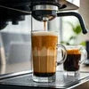 Cold coffee mix Sector 102 Noida freshly brewed in espresso machine with creamy froth
