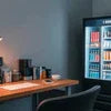 Atlantis coffee premix dealer near me with vending machine and coffee supplies on wooden counter
