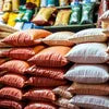 Stacked bags of best coffee powder in Gurga displayed in a market or store setting