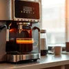 Modern coffee machine suppliers espresso maker brewing fresh coffee in kitchen setting