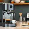 Atlantis coffee machine supplier in Noida espresso maker with cup on kitchen counter