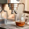 Commercial coffee machine for office use brewing espresso in glass cup