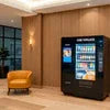 Vending machine with beverages and snacks for hotel guest experience and convenience