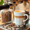 Commercial espresso machine with milk frother brewing coffee for office use