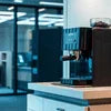 Coffee machine on counter in modern office setting perfect for best coffee machines for DLF Cyber City offices