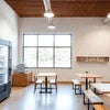 college canteen coffee machine Gurugram installed in bright modern cafe seating area
