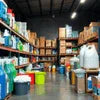 Cleaning product distributor Noida warehouse with shelves stocked with various cleaning supplies and containers