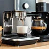 Bean to cup coffee machine Delhi brewing fresh coffee with cup and carafe