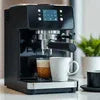 Nescafe coffee machine dealers near noida uttar pradesh showing a black espresso coffee maker with cup