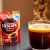 Nescafe 3-in-1 coffee premix pack with steaming cup for office and cafe vending