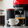 Nescafe vending machine for cafes dispensing fresh coffee with cup