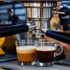 Espresso machine brewing coffee shots for best cafe coffee machine Kolkata in cafe vending