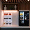 Nescafe coffee vending machine for office use in black with multiple coffee options in Mizoram