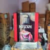 Nescafe coffee machine under 10000 price model displayed in store with packaging boxes