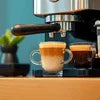 Espresso coffee machine with glass cup brewing coffee for cafe vending tea and coffee machine service Noida