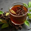 Lamato Instant Tea clear glass cup with star anise for office and cafe vending