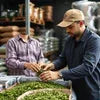 Lamato Tea Supplier employees sorting fresh tea leaves for cafe vending
