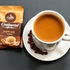 Continental Coffee Premix Powder Ghaziabad pack with cup of brewed coffee for office vending