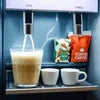 Bruax Dairy Whitener Premix single serve sachet with coffee cups for office and cafe vending