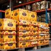 Tata Tea Gold Wholesale Dealer bulk packs stacked for office and cafe vending