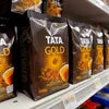 Tata Gold coffee bags on store shelf for brewing fresh Nescafe coffee machine India use