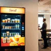Tea Coffee Vending Noida Swello branded vending machine with multiple beverage options in office setting