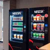 Nescafe ATLANTIS COFFEE MACHINE and vending machine in black for office use with various drinks