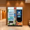ATLANTIS COFFEE MACHINE vending model in white and black for office use with touch screen and beverage options