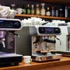 Silver Nescafe coffee machines model Mavea 3.0 placed on wooden counter for office use NESCAFE COFFEE MACHINE RENTAL