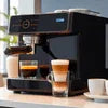 Atlantis coffee machine Noida black office model brewing coffee with milk frother and cups