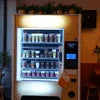 Atlantis Cafe Machine Ghaziabad vending machine with drinks in white for office use