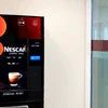 Black Nescafe vending machine Gurgaon model with coffee options for office use