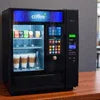 Table top vending machine Tripura black compact model for office use with snacks and drinks